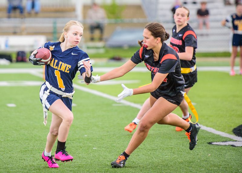 Northville's Lili Vettraino records a tackle for loss during a Michigan Girls High School Flag Football League game on Saturday, May 9, 2026.