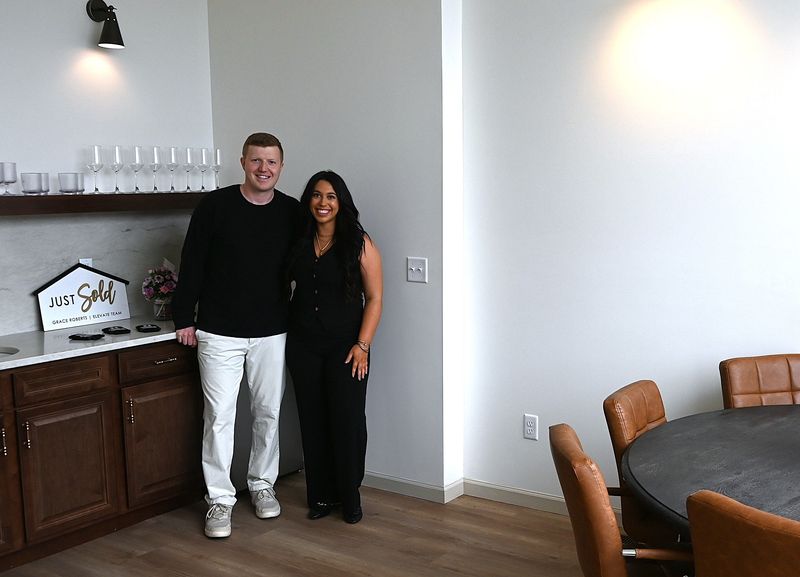 Noah and Grace Roberts at 44 West Pearl St. at the Grace Roberts-Elevate Michigan Top Producers realty office where they created five new downtown rental apartments.