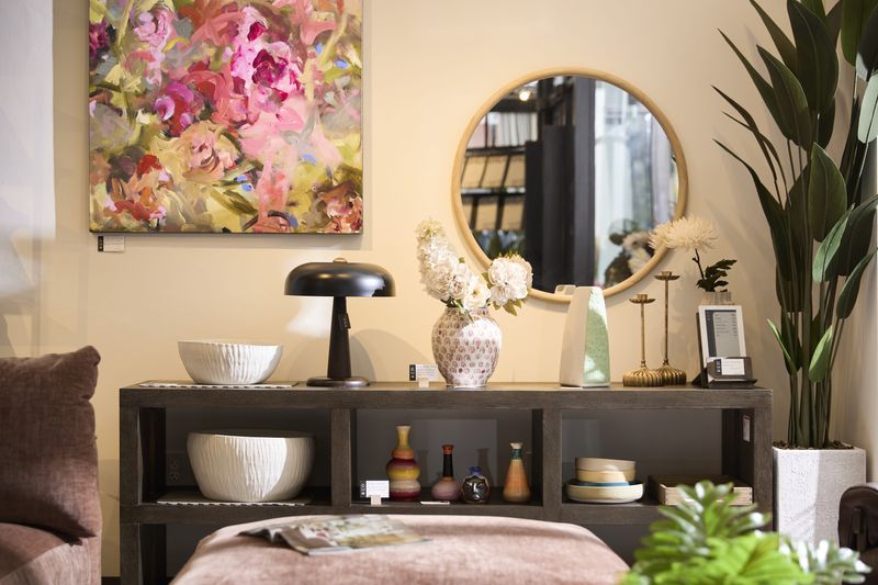 Spring trends include florals and other colorful decor elements.