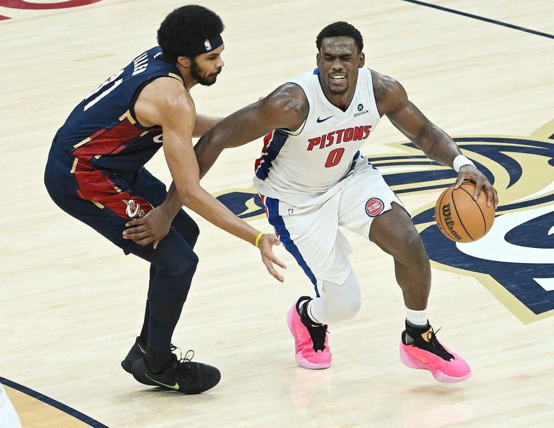 Detroit Pistons center Jalen Duren (0) drives past Cleveland Cavaliers center Jarrett Allen (31) during the first half of Game 4 of the Eastern Conference Semifinal series at Rocket Arena in Cleveland, Monday, May 11, 2026, in Cleveland, Ohio.