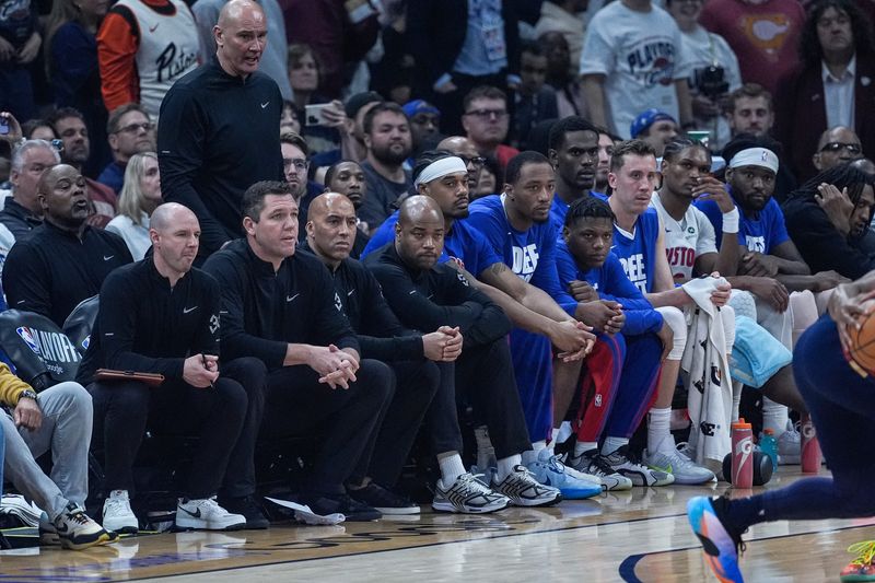 Detroit Pistons bench watches a play against the Cleveland Cavaliers during the second half of Game 4 of the second round of the NBA playoffs at Rocket Arena in Cleveland on Monday, May 11, 2026.