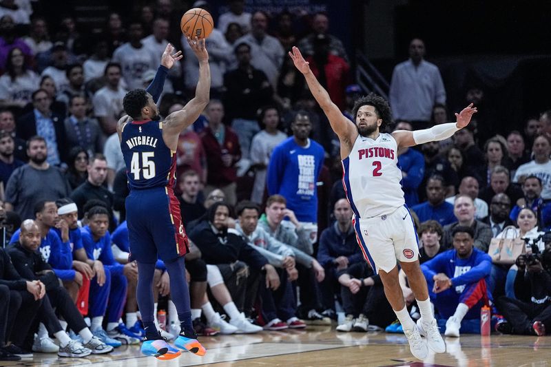Cleveland Cavaliers guard Donovan Mitchell shoots a 3-pointer against Detroit Pistons guard Cade Cunningham during the second half of Game 4 of the second round of the NBA playoffs at Rocket Arena in Cleveland on Monday, May 11, 2026.