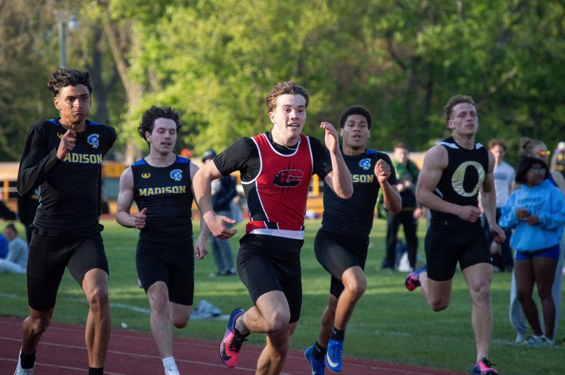 Clinton freshman Wyatt Dehring wins the 200-meter dash LCAA championship.