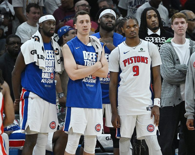 Detroit Pistons guard Caris LeVert (8), Detroit Pistons forward Duncan Robinson (55) and Detroit Pistons guard/forward Ausar Thompson (9) look dejected late in the second half. Detroit Pistons vs Cleveland Cavaliers, Round 2, Game 4, at Rocket Arena on Monday, May 11, 2026, in Cleveland, Ohio