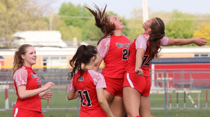 Milan celebrates a goal against Jefferson-Erie Mason during a 6-2 Milan victory on Monday, May 11, 2026.