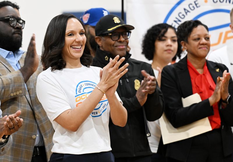Detroit Mayor Mary Sheffield applauds during a press conference about Occupy the Summer, the city's summer recreation program for youth at a recreation center in Detroit. The city's population increased in 2025 for the third year in a row.