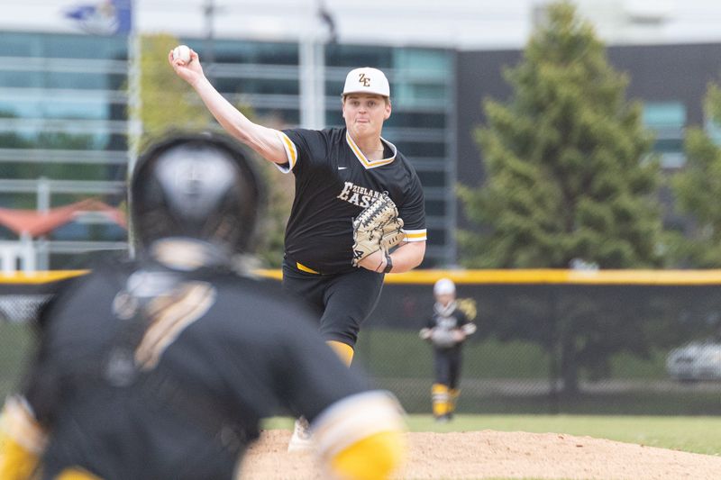 Zeeland East's Mason Raade pitches against Zeeland West on Tuesday, May 12.