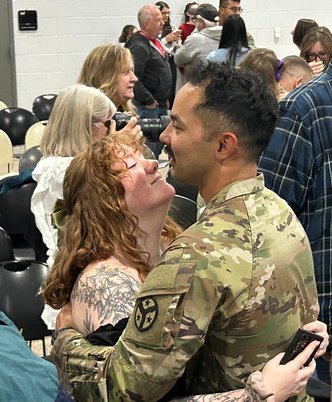 Loved ones embrace after members of the Michigan Army National Guard’s 3rd Battalion, 126th Infantry Regiment arrive back in Michigan after 10 months overseas in support of U.S. Central Command security operations.