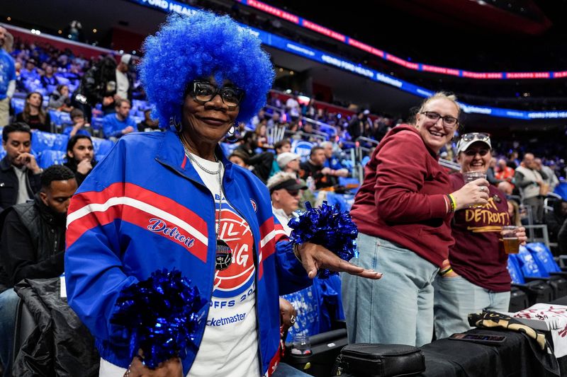 Detroit Pistons fans cheer on as they watch warms up ahead of Game 5 of second round of NBA playoffs at Little Caesars Arena in Detroit on Wednesday, May 13, 2026.