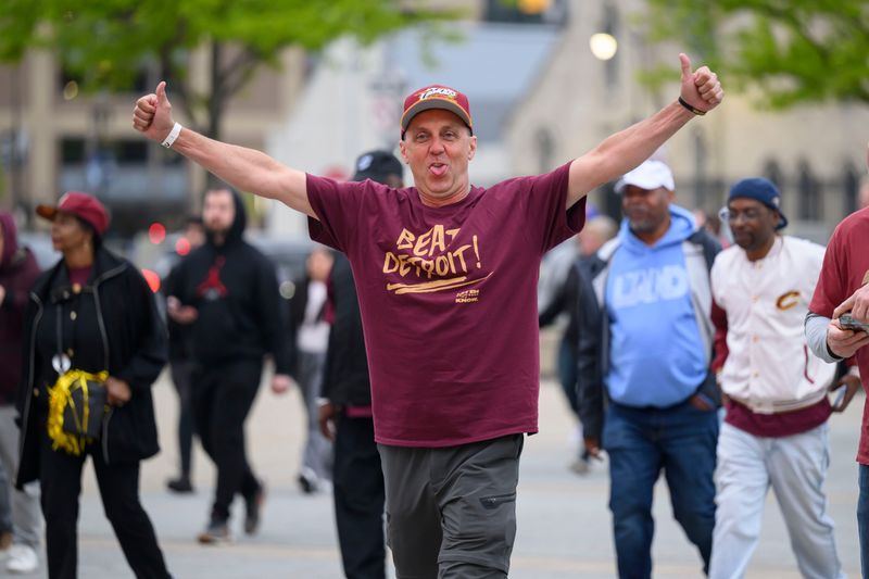 Michael Meyer, of Cleveland, arrives with hundreds of other Cavalier fans, courtesy of Dan Gilbert, before the start of game five of the NBA Eastern Conference semi-finals between the Detroit Pistons and the Cleveland Cavaliers, at Little Caesars Arena, in Detroit, May 13, 2026.