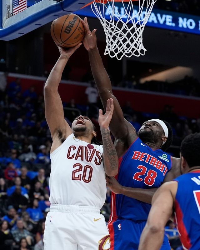 Detroit Pistons center Isaiah Stewart blocks Cleveland Cavaliers guard Jaylon Tyson during the first half of Game 5 in the second round of the NBA playoffs at Little Caesars Arena in Detroit on Wednesday, May 13, 2026.