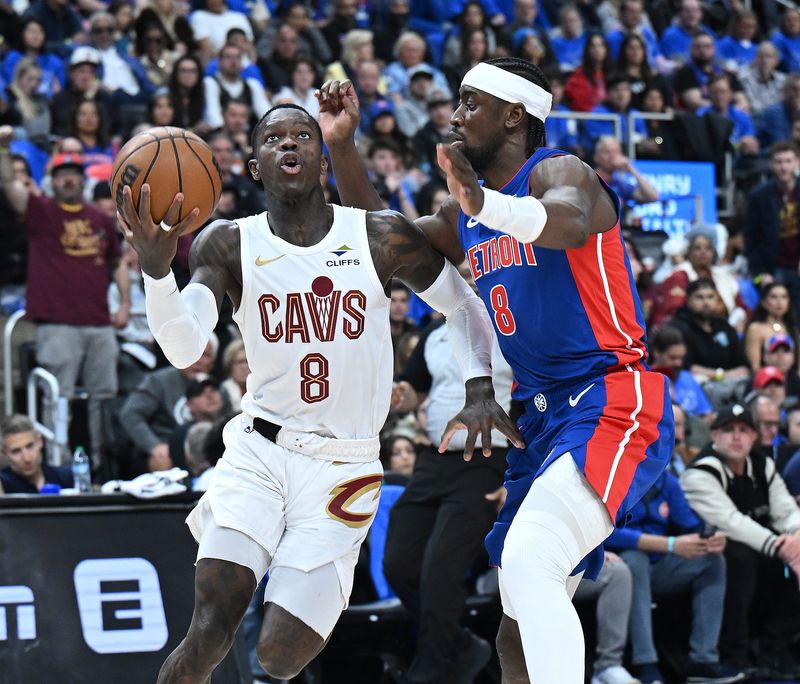 Cleveland Cavaliers guard Dennis Schröder (8) shoots over Detroit Pistons guard Caris LeVert (8) in the first half.