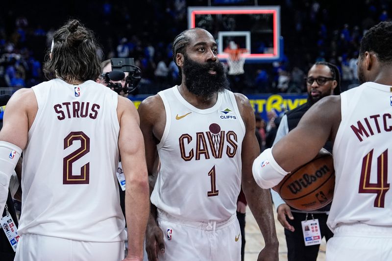 Cleveland Cavaliers guard James Harden (1), center, celebrates 117-113 overtime win over Detroit Pistons with guard Max Strus (2) and guard Donovan Mitchell (45) in Game 5 of second round of NBA playoffs at Little Caesars Arena in Detroit on Wednesday, May 13, 2026.