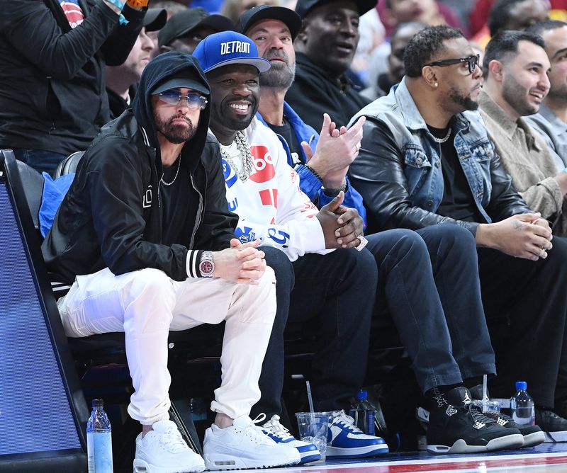 Eminem, from left, and 50cent attended the game. Detroit Pistons vs Cleveland Cavaliers, Eastern Conference Semi-Finals, Game 5, at Little Caesars Arena on Wednesday, May 13, 2026, in Detroit, MI