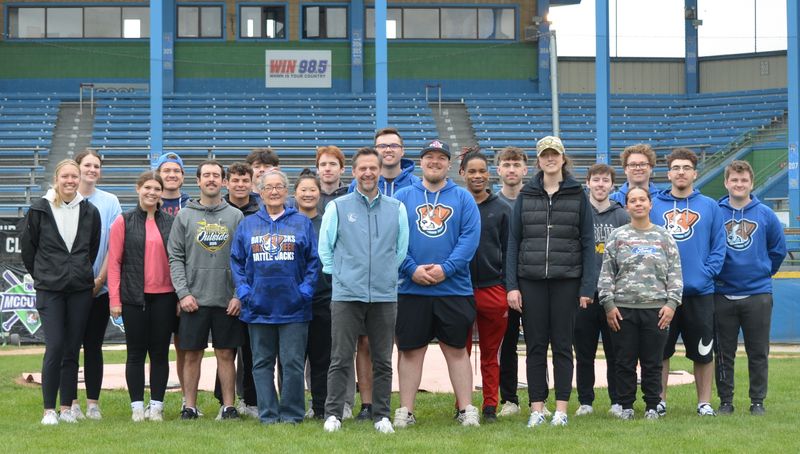 The Battle Creek Battle Jacks owner Scott Miles, center, has a new team behind him as he promises a new, improved baseball experience for the Northwoods League team at MCCU Field at C.O. Brown Stadium.