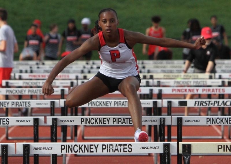 Pinckney's Davea Crowe won the 100-meter hurdles during a track and field meet against Jackson on Tuesday, April 14, 2026.