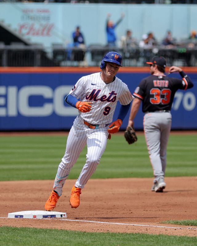 New York Mets center fielder A.J. Ewing (9) rounds the bases after hitting a solo home run against the Detroit Tigers during the third inning at Citi Field. The home run was the first of his MLB career.