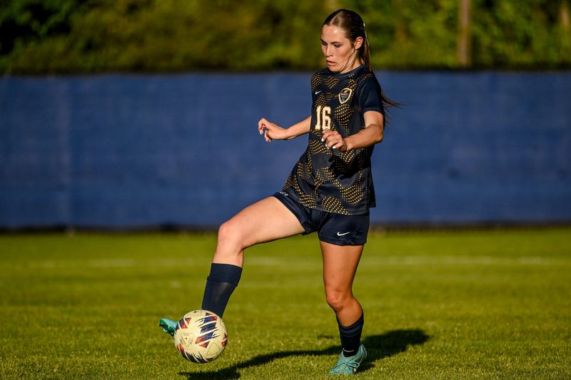 DeWitt's Ella Rogers controls the ball against Mason during the first half in the CAAC Gold Cup final on Thursday, May 14, 2026, in DeWitt.