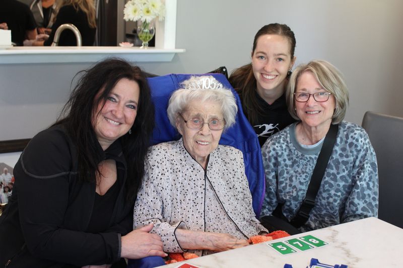 Lori Luomala, Dorothy Macut, Lauren Luomala and Lucy Mainwaring pose for a photo during a birthday celebration May 8, 2026, in Oceola Township.