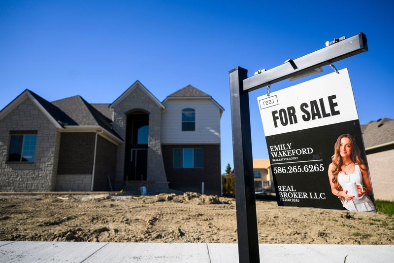 A sign advertises a home for sale on Thursday, May 14, 2026 in New Baltimore, Mich.