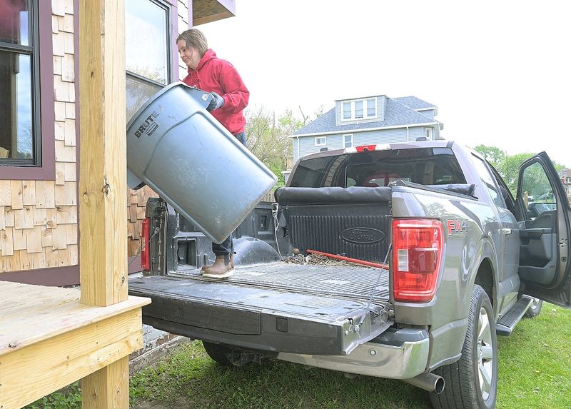 Jordan Yagiela, who runs a construction business, with her F-150 at a work site in Detroit on Friday, May 15, 2026. She had this to say about the increase in gas prices: “I don’t love it, I don’t love it at all. Every time I go to fill up my tank, it is a painful experience."
