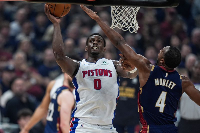 Detroit Pistons center Jalen Duren (0) goes to the basket against Cleveland Cavaliers center Evan Mobley (4) during the first half of Game 6 of the second round of the NBA playoffs at Rocket Arena in Cleveland on Friday, May 15, 2026.