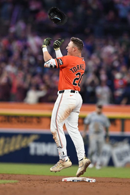 Detroit Tigers first baseman Spencer Torkelson (20) throws his helmet in the air after hitting a walk-off RBI double against the Toronto Blue Jays in the ninth inning May 15, 2026 at Comerica Park.