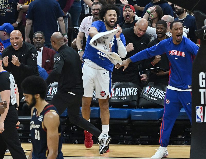 Detroit Pistons guard Cade Cunningham (2) and Detroit Pistons forward Ronald Holland II (5) celebrate in the second half. Detroit Pistons vs Cleveland Cavaliers, Eastern Conference Semi-Finals, Game 6, at Rocket Arena on Friday, May 15, 2026, in Cleveland, Ohio