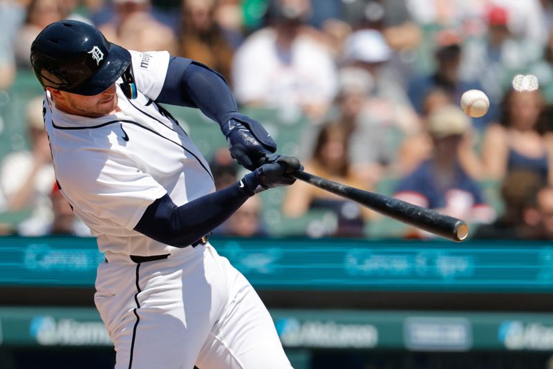 Detroit Tigers catcher Dillon Dingler (13) hits a single in the first inning against the Toronto Blue Jays at Comerica Park in Detroit on Sunday, May 17, 2026.