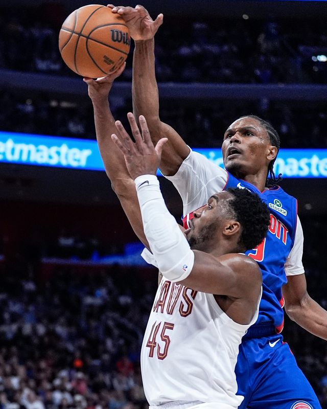 Detroit Pistons forward Ausar Thompson blocks the shot of Cleveland Cavaliers guard Donovan Mitchell during the first half of Game 7 of the second round of the NBA playoffs at Little Caesars Arena in Detroit on Sunday, May 17, 2026.