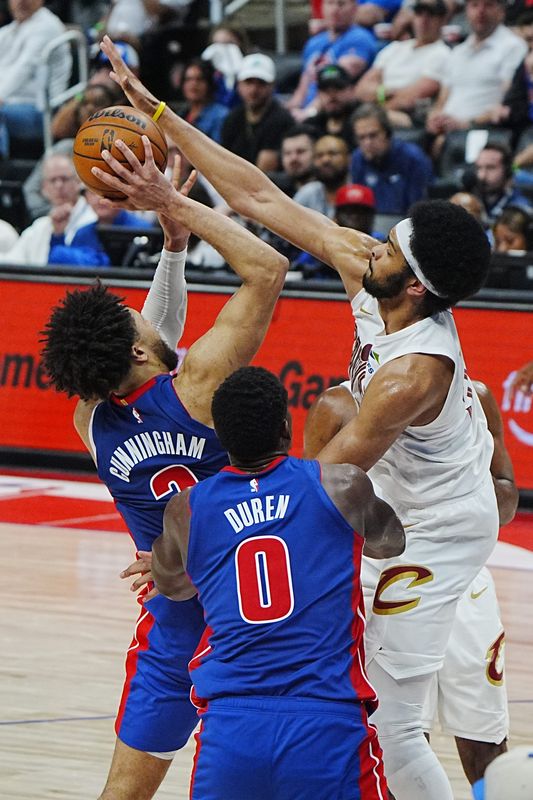 Detroit Pistons guard Cade Cunningham (2) has his shot blocked by Cleveland Cavaliers center Jarrett Allen (31) during the first half of game 7 of the NBA playoffs at Little Caesars Arena in Detroit, Sunday May 17, 2026.