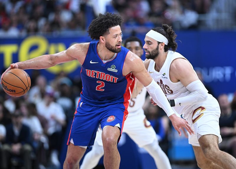 Detroit Pistons guard Cade Cunningham (2) looks for room around Cleveland Cavaliers guard/forward Max Strus (2) in the first half. Detroit Pistons vs Cleveland Cavaliers, Eastern Conference Semi-Finals, Game 7, at Little Caesars Arena on Sunday, May 17, 2026, in Detroit, MI