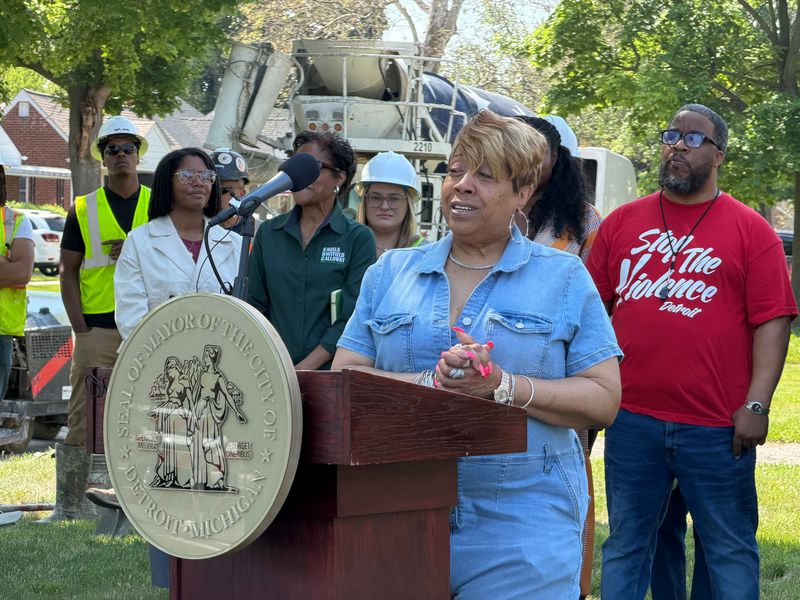 Detroit resident Sherry Rhetta speaks about the importance of fixing her sidewalk to boost quality of life in her neighborhood, after Mayor Mary Sheffield announced a $9.5 million program to clear a backlog of broken sidewalks, on Monday, May 18, 2026.