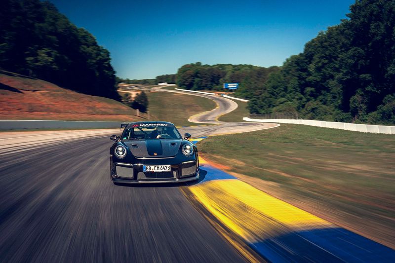 Porsche911 GT2 RS with Manthey Kit roars through the esses at Road Atlanta.