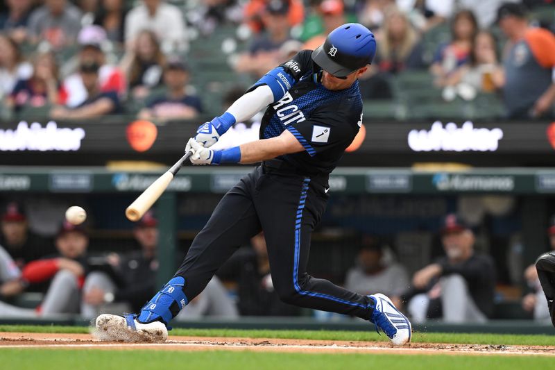 Detroit Tigers third baseman Kevin McGonigle (7) hits a single against the Cleveland Guardians in the first inning at Comerica Park in Detroit on Monday, May 18, 2026.