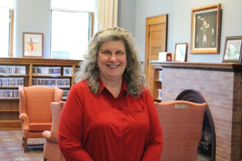 Diane McKee poses for a photo during her anniversary celebration at the Howell Carnegie District Library on May 14.