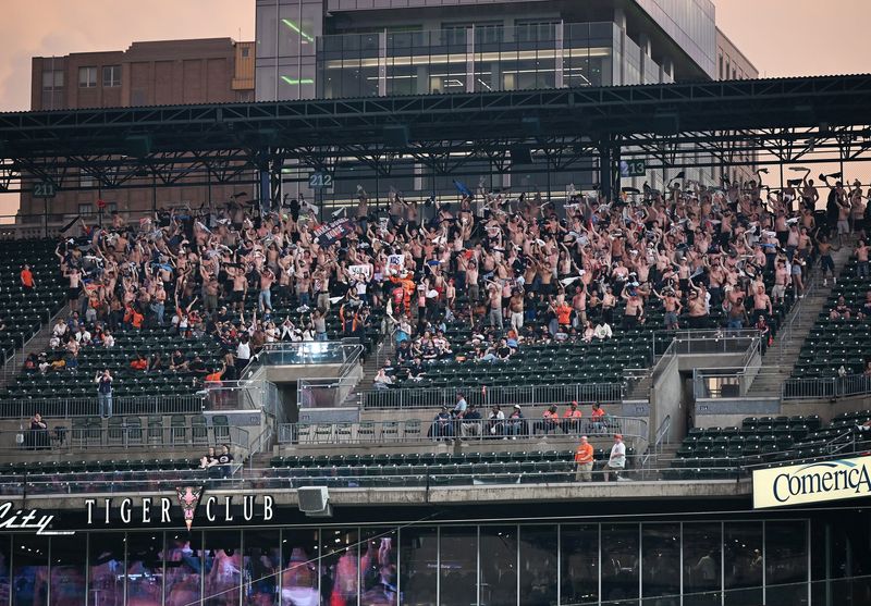 Shirtless men wave their shirts in the air in section 213 and 212 in the ninth inning. Detroit Tigers take on the Cleveland Guardians on May 19, 2026 at Comerica Park in Detroit.