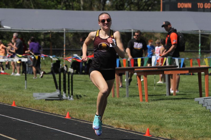 Ella Heffner of Charyl Stockwell won the 1,600- and 800-meter runs during the MIAC track and field championships.