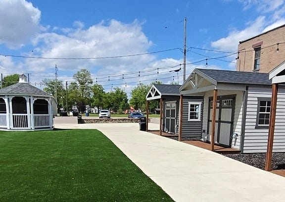 The Quincy Village council is looking for proposals to sell of 14 East Chicago and the sheds on the lot.