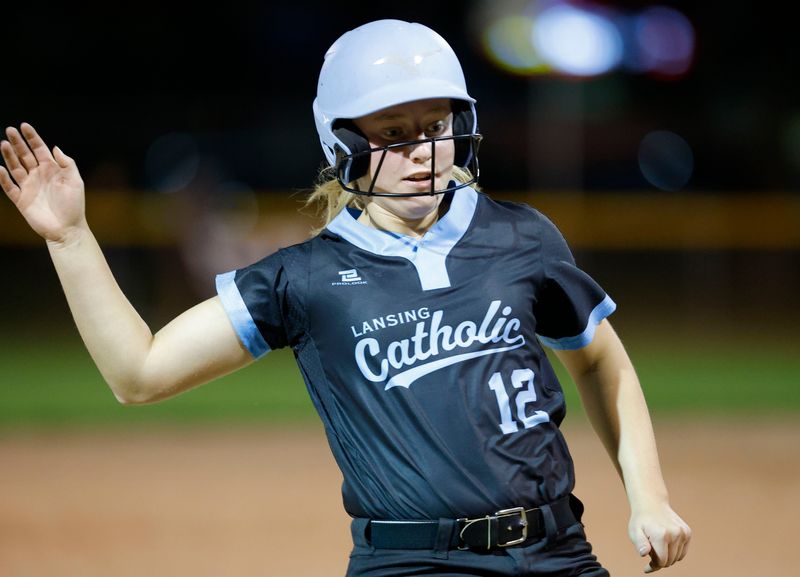 Lansing Catholic's Avery Dunneback advances to third against Fowler, Tuesday, May 19, 2026, at Ranney Park.