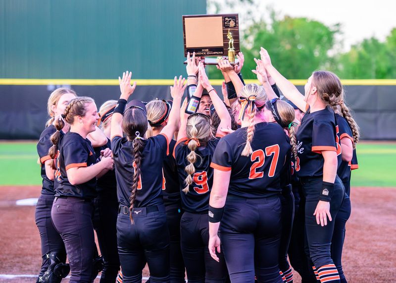 Northville celebrates winning the Kensington Lakes Activities Asociation softball championship on Wednesday, May 20, 2026, at Novi High School.
