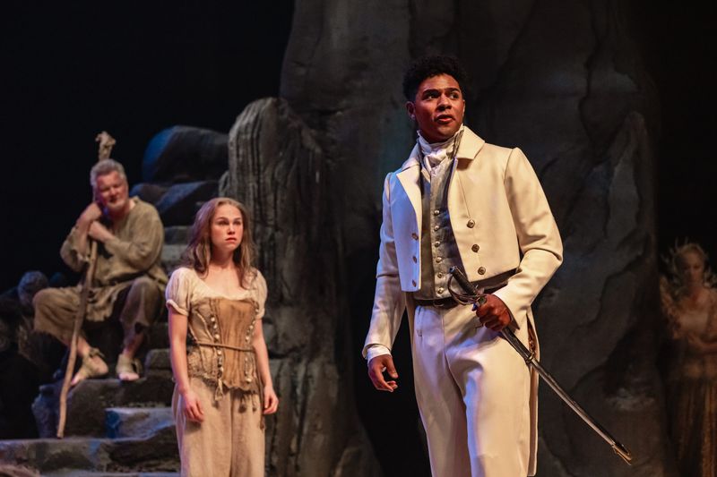 From left, Geraint Wyn Davies as Prospero, Ashley Dingwell as Miranda and Dakota Jamal Wellman as Ferdinand in Shakespeare's "The Tempest" at the 2026 Stratford Festival.