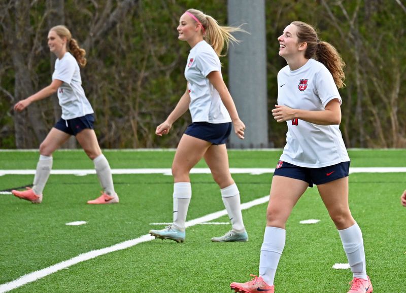 Bridget McHugh (front, right), Addy Burns (middle) and the rest of the Boyne City backline helped pitch a shutout and deliver a victory to begin the postseason in Division 3.