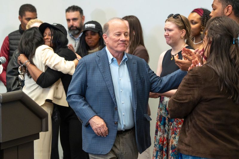 Former Detroit Mayor Mike Duggan, thanks staff after talking to the press during his announcement that he is dropping out of the gubernatorial race for the state of Michigan on Thursday, May 21, 2026, at Huntington Place in downtown Detroit.