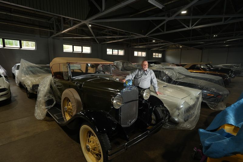 Lansing developer Paul Gentilozzi talks about his passion for cars, Tuesday, May 19, 2026, during a visit at the former Lansing State Journal headquarters in Lansing where many of the vintage automobiles in his collection are housed.