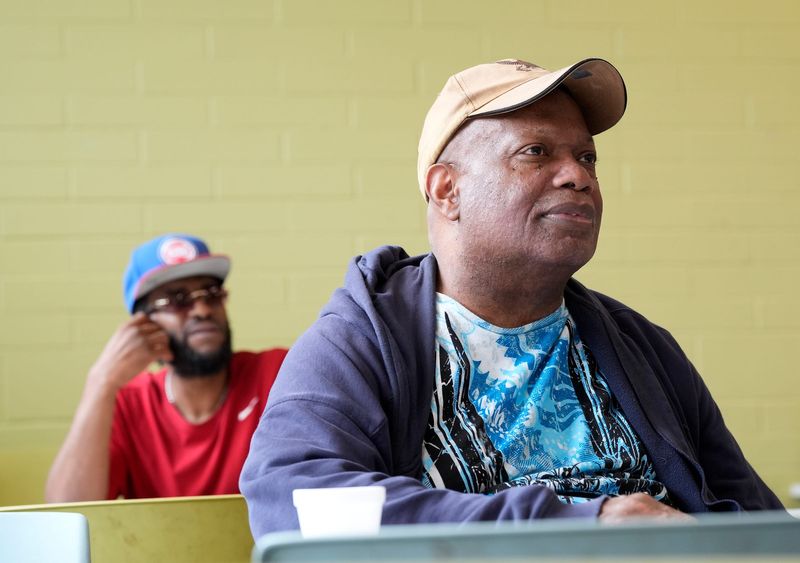 Brian Ellsworth listens to Michelle Johnson, the president and CEO of Legal Aid and Defender talk with him and other veterans inside the Michigan Veterans Foundation (MVF) in Detroit on Wednesday, May 20, 2026.
Johnson came by to offer assistance and answer any questions from legal and other matters.