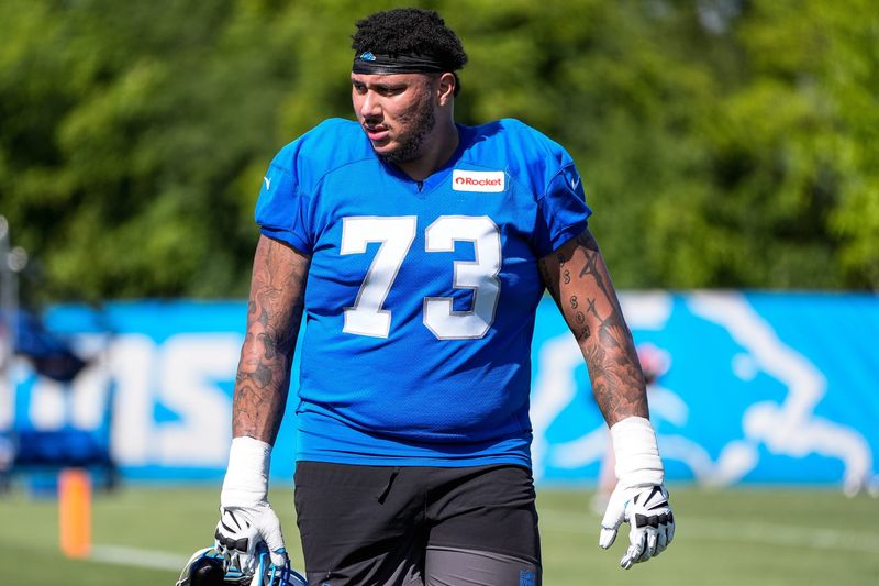 Detroit Lions guard Christian Mahogany (73) walks of the field after practice during training camp at Meijer Performance Center in Allen Park on Tuesday, July 22, 2025.