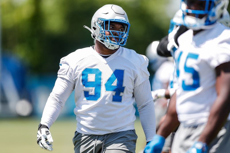 Detroit Lions defensive lineman Mekhi Wingo (94) practices during OTAs at Detroit Lions headquarters and practice facility in Allen Park on Tuesday, June 11, 2024.