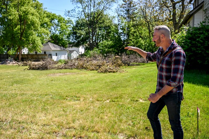 Bradly Rakowski shows off the lot where he is moving the Kilbourne-Mead House to on Thursday, May 21, 2026, in Lansing.