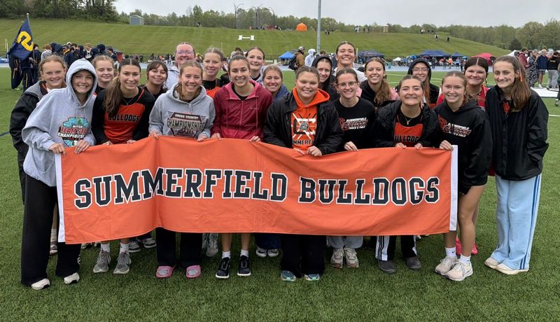 Summerfield celebrates taking third place in the Michigan Interscholastic Track Coaches Association Division 4 team championships on Saturday, May 23, 2026.